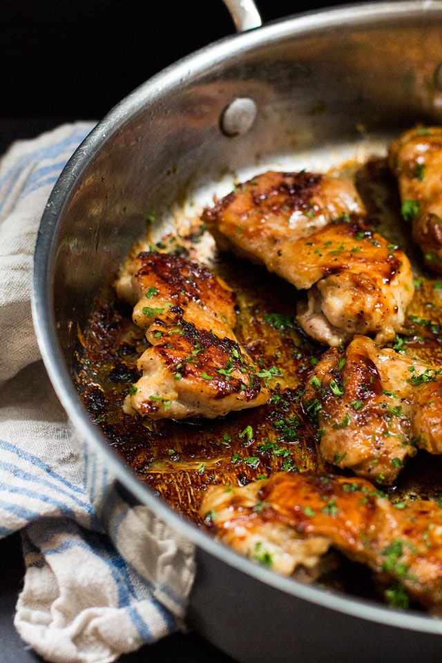 Sweet and salty chicken thighs in a stainless steel skillet