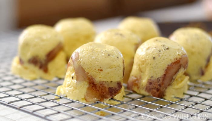 Instant Pot Bacon-Cheddar Egg Bites cooling on a wire rack © COOKING WITH CURLS