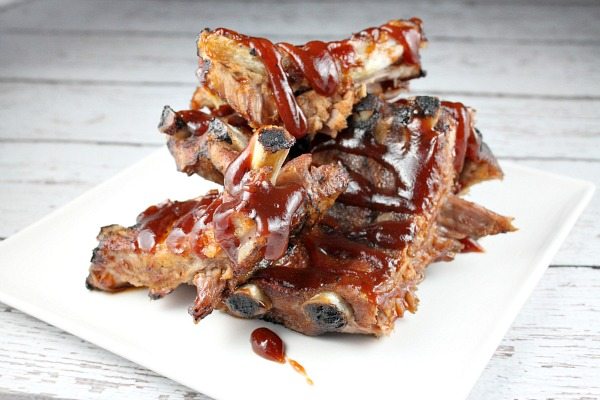 barbecued ribs on a white plate