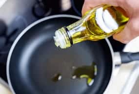 season a non-stick pan with olive oil